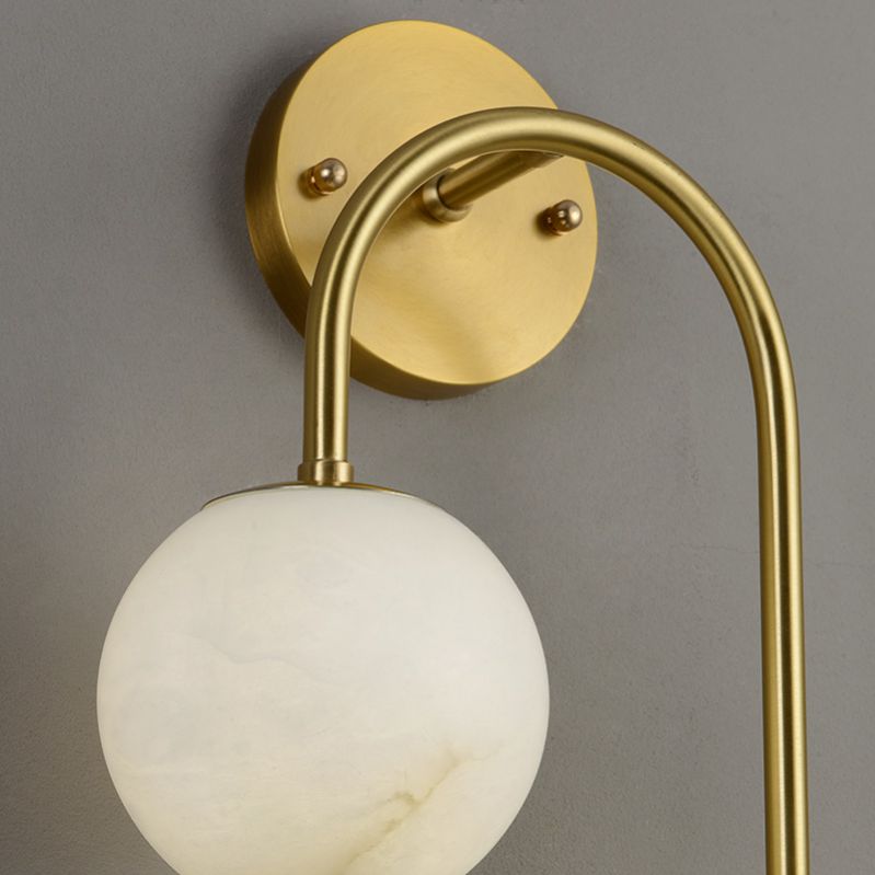 Alabaster Glo Modern Wall Sconce In Bedroom - thebelacan