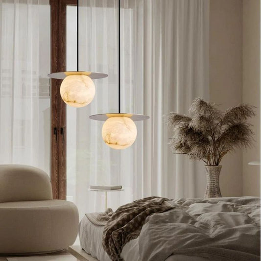 Alabaster Sphere Pendant Light Above Bed - thebelacan
